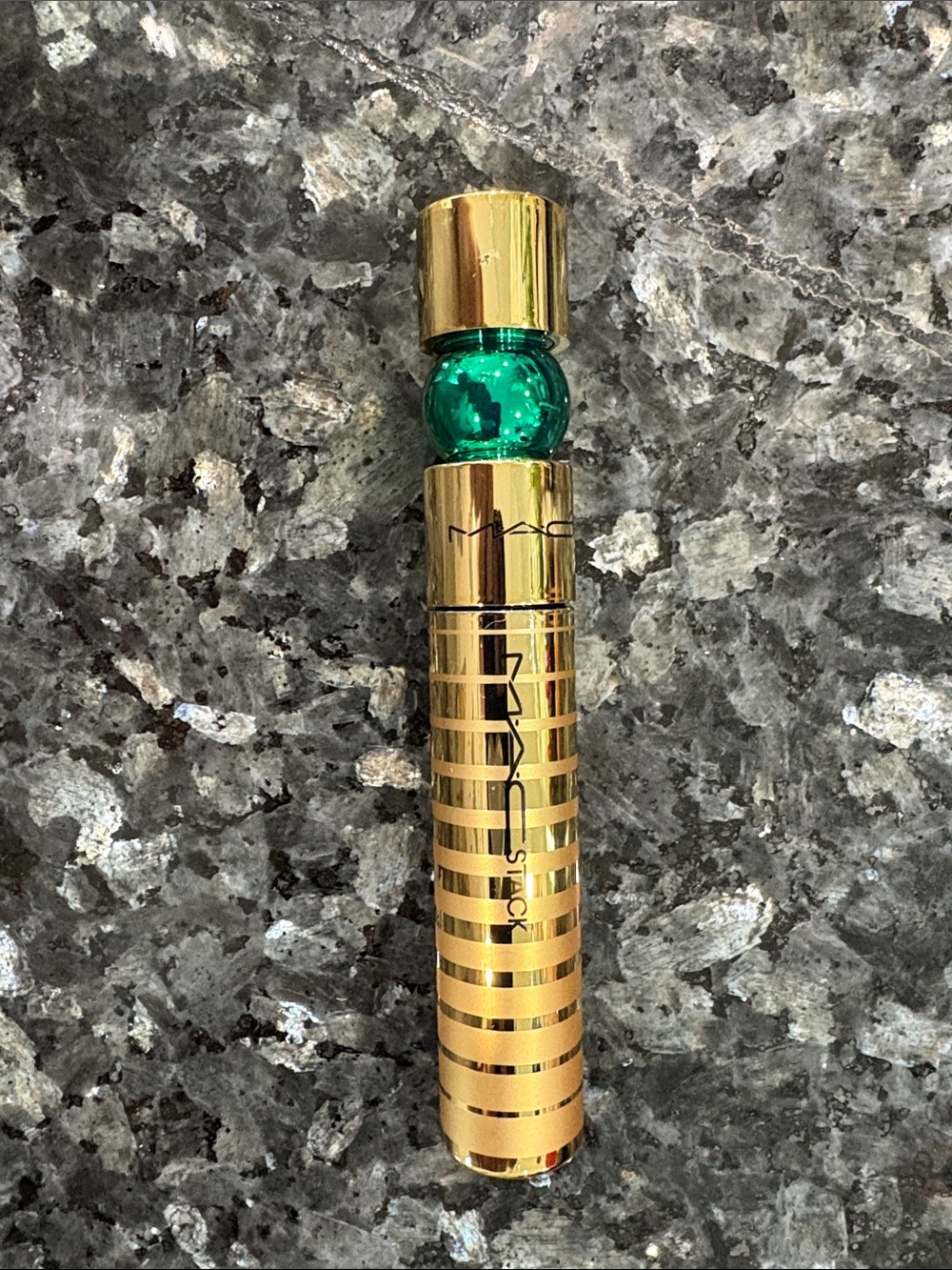 MAC Gold Lipstick Stick with Green Accent